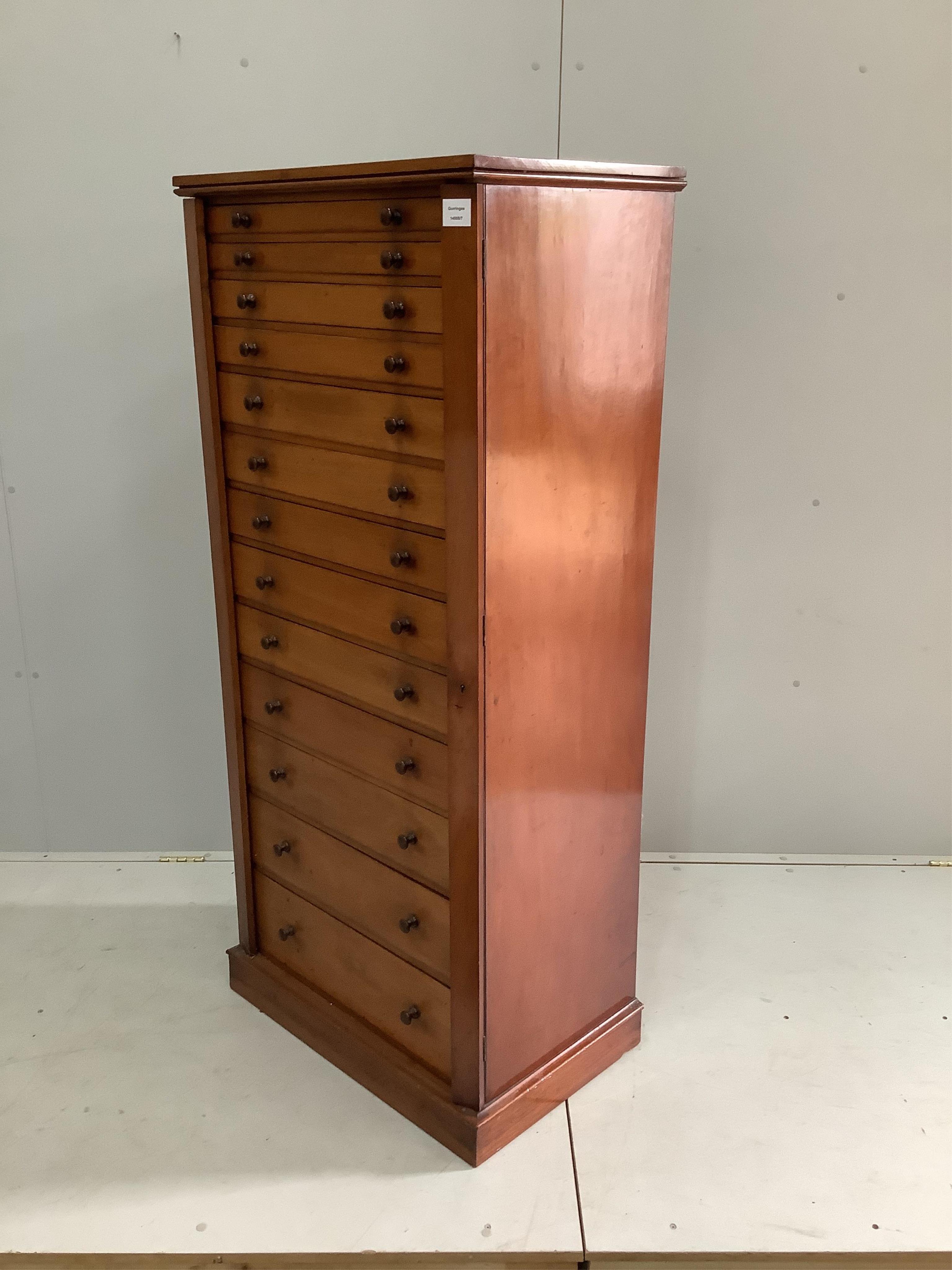 A Victorian mahogany thirteen graduated drawer collector's chest, with side locking bars, width 68cm, depth 44cm, height 153cm. Condition - fair